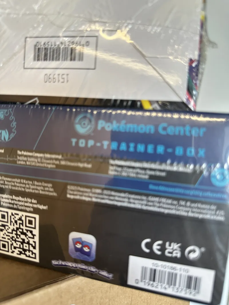 Schlechtes Beispiel: unscharfes, schräg aufgenommenes Foto – die Barcode-Ziffern sind nicht lesbar.